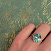 blauwe topaas ring cluster diamant halo