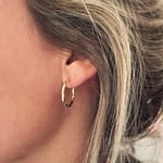 gouden_creolen_oorbellen_gedraaid_goud gouden oorbellen gedraaide oorringen van goud