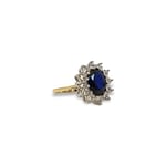 entourage ring goud blauwe steen cz