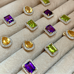 gouden oorbellen edelsteen en diamant cluster