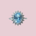 cluster ring witgoud lichtblauwe steen