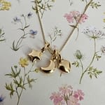 gouden_bedels_sterretje_maantje_hartje_9kt_goud gouden bedels van sterretje, maantje en hartje van 9kt goud