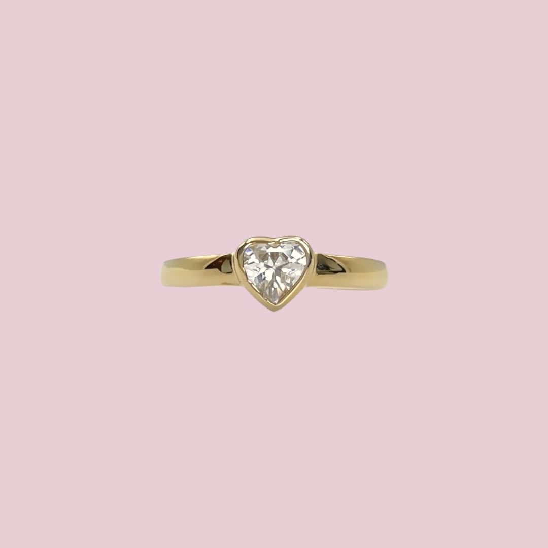 gouden teenring met hartje steen
