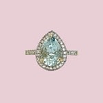 aquamarijn peer pear cut ring met diamant halo 10 karaat goud