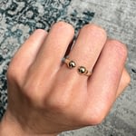 gouden torque open ring 2 bollen