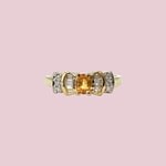 ring oranje saffier diamant cluster