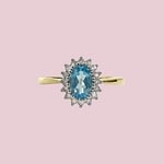 cluster ring topaas en diamant lichtblauwe steen