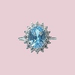 cluster ring witgoud lichtblauwe steen