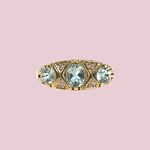 vintage trilogie ring topaas en diamant