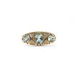 vintage trilogie ring topaas en diamant van goud