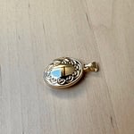 locket ovaal van goud 9kt blossom motief