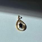 gouden saffier en diamant hangertje van vintage 9 karaat