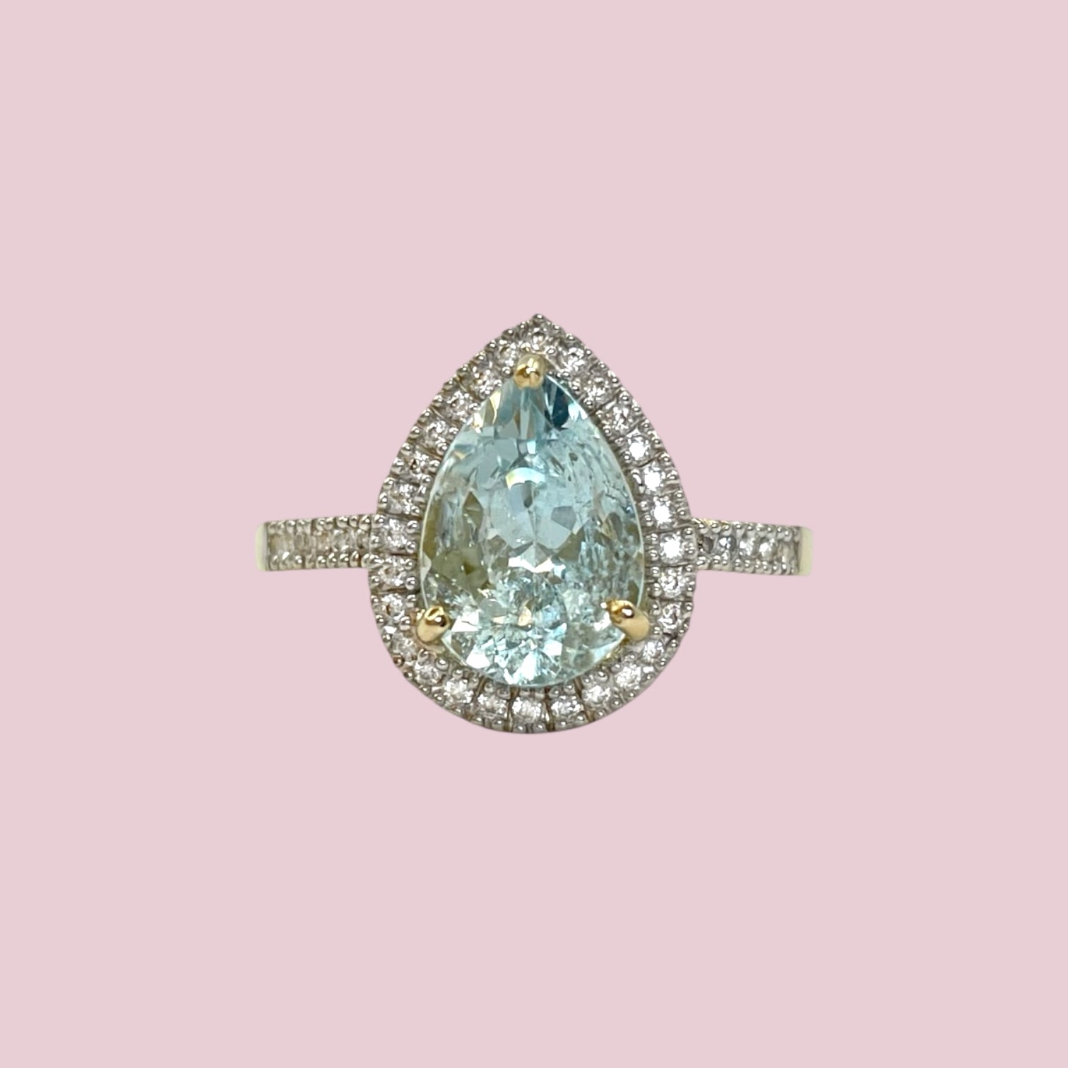 aquamarijn peer pear cut ring met diamant halo 10 karaat goud