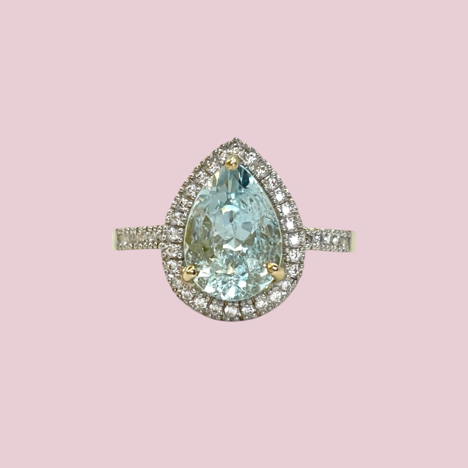aquamarijn peer pear cut ring met diamant halo 10 karaat goud