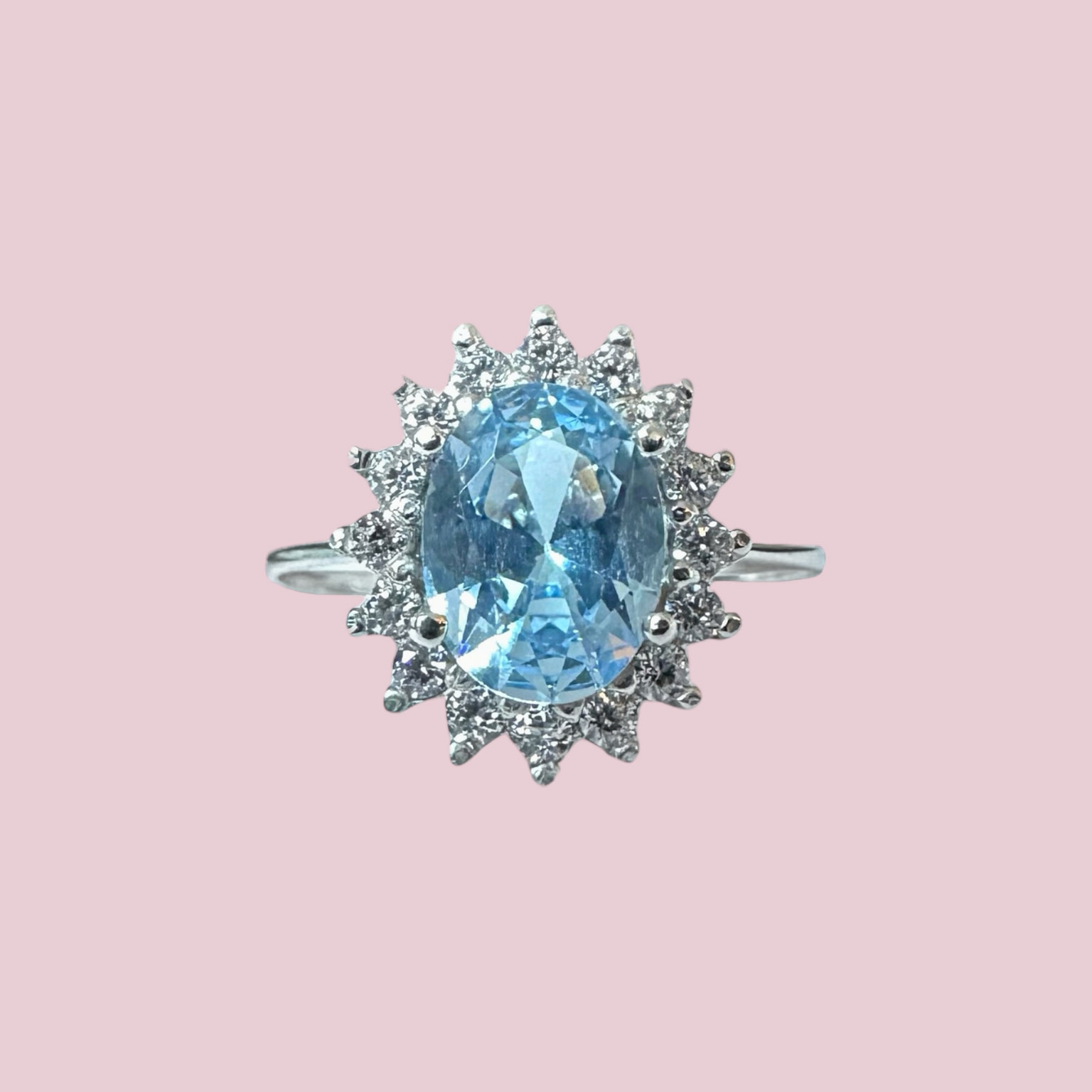 cluster ring witgoud lichtblauwe steen