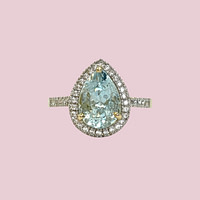 aquamarijn peer pear cut ring met diamant halo 10 karaat goud