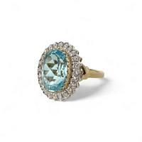 vintage gouden ring blauwe steen en diamant entourage
