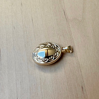 locket ovaal van goud 9kt blossom motief