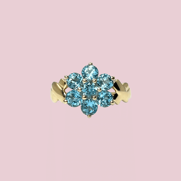 vintage ring met bloem van blauwe topaas