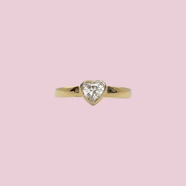 gouden teenring met hartje steen