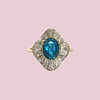 vintage ring topaas en diamant in gegolfde zetting