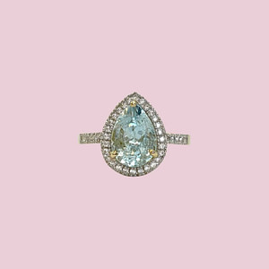 aquamarijn ring met diamant halo 10 karaat goud