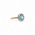 cluster ring lichtblauwe steen topaas en diamant