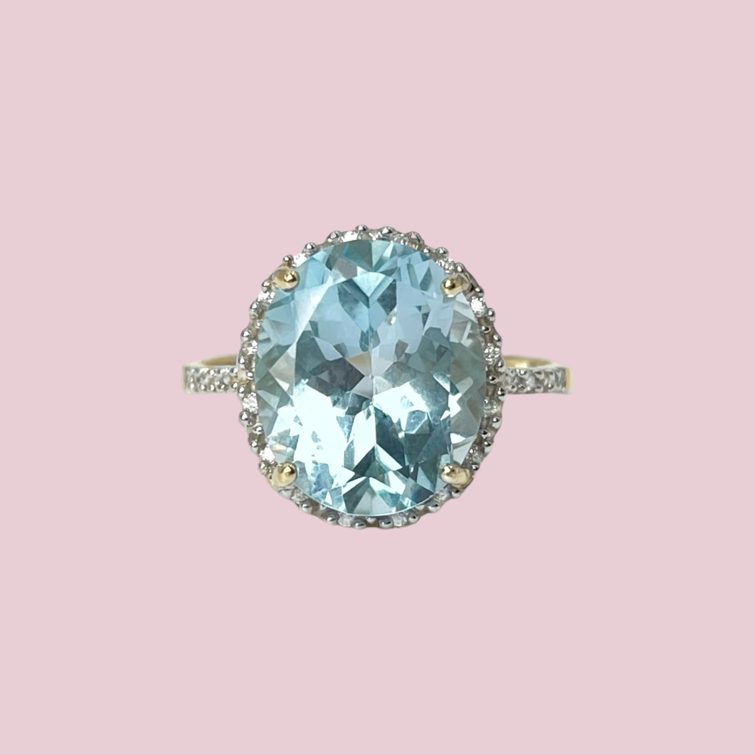 blauwe topaas saffier ring met diamant halo 10k goud