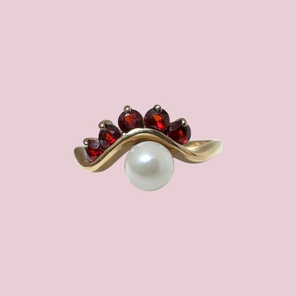 vintage ring granaat en parel oog vorm van 9 karaat goud