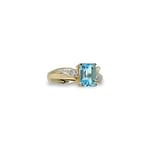 topaas ring emerald cut gedraaid