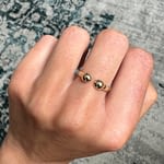 gouden torque open ring 2 bollen