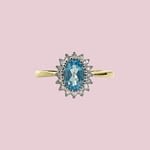 cluster ring topaas en diamant lichtblauwe steen