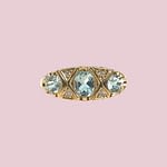 vintage trilogie ring topaas en diamant