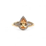 vintage ring met gele topaas peer en halo van 9k goud