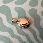 vintage gouden locket van een klein hartje