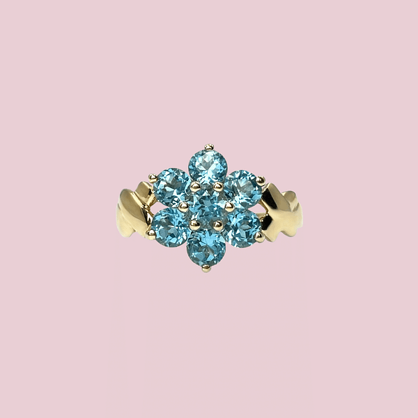 vintage ring met bloem van blauwe topaas