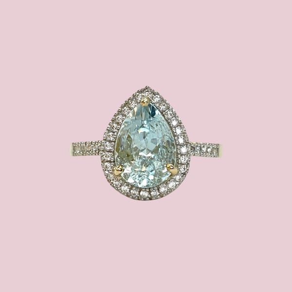 aquamarijn peer pear cut ring met diamant halo 10 karaat goud