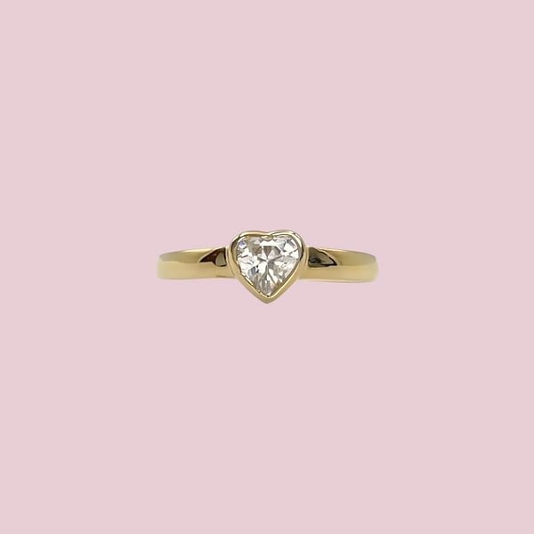 gouden teenring met hartje steen
