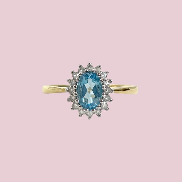 cluster ring topaas en diamant lichtblauwe steen