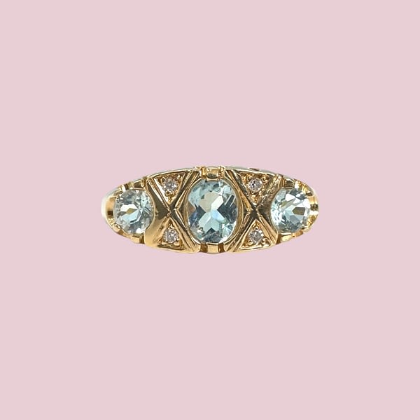 vintage trilogie ring topaas en diamant