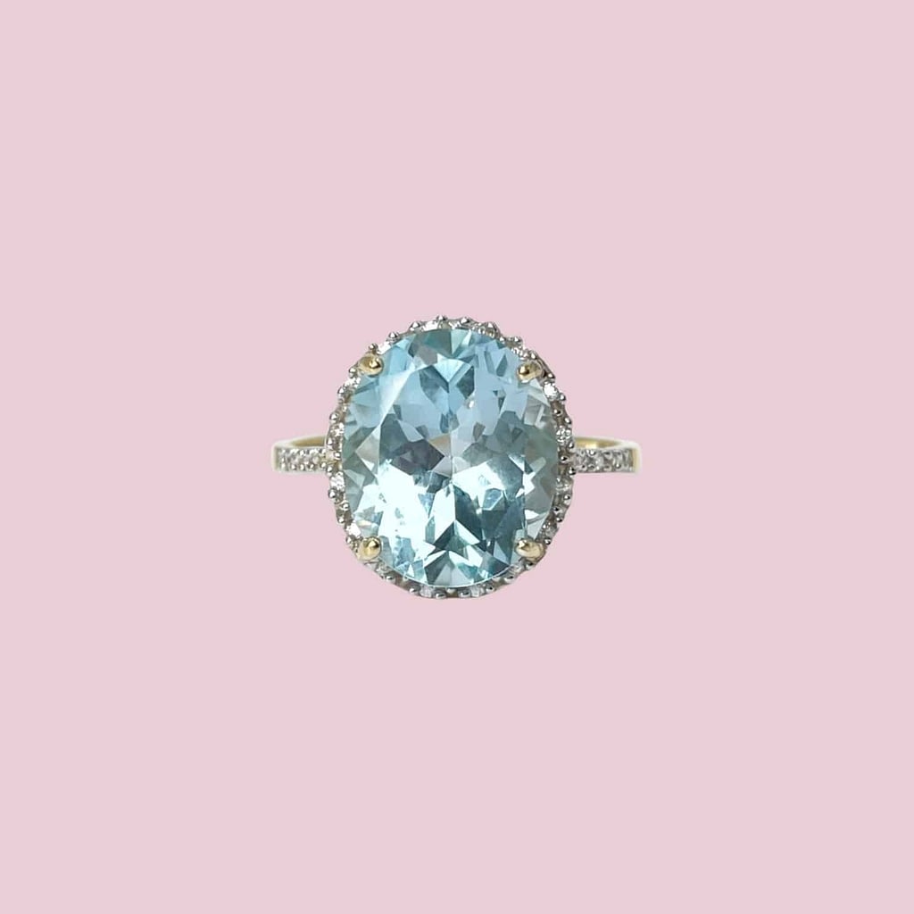 blauwe saffier ring diamant halo 10 karaat goud